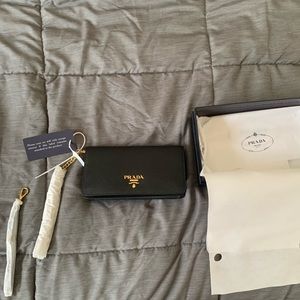 New Prada Saffiano Leather Mini Bag. Never used, still in packaging.